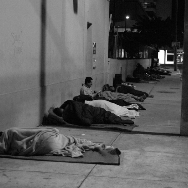 Homeless adults sleeping outside