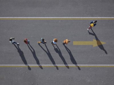 Overhead photo of people walking in street