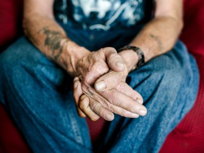 Image of older person's weathered hands